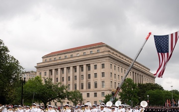 The United States Navy Band marches in the National Memorial Day Parade along Constitution Avenue in Washington, DC.