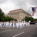 The United States Navy Band marches in the National Memorial Day Parade along Constitution Avenue in Washington, DC.