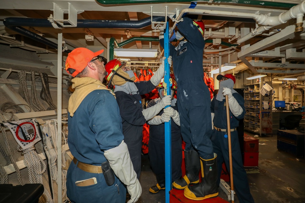 Sailors aboard the USS Howard conduct a general quarters drill in the South China Sea