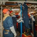 Sailors aboard the USS Howard conduct a general quarters drill in the South China Sea