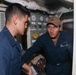 Sailors aboard the USS Howard conduct engineering training team drills in the North Pacific Ocean