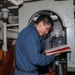 Sailors aboard the USS Howard conduct engineering training team drills in the North Pacific Ocean