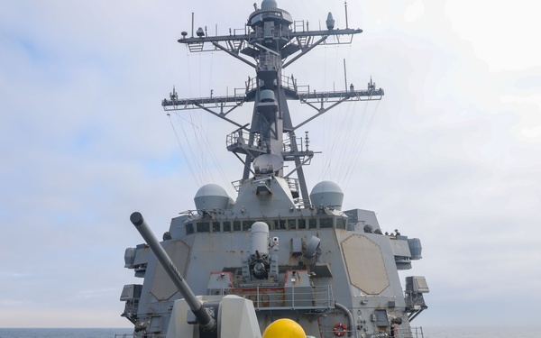Sailors aboard the USS Howard conduct a sea and anchor detail in Yokosuka, Japan