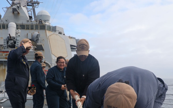 Sailors aboard the USS Howard conduct a sea and anchor detail in Yokosuka, Japan