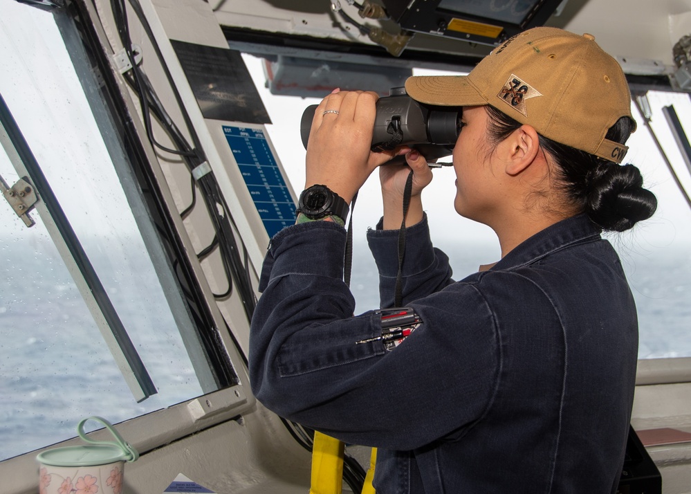 USS Ronald Reagan (CVN 76) Sailors stand watch in the pilot house