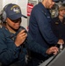 USS Ronald Reagan (CVN 76) Sailors stand watch in the pilot house