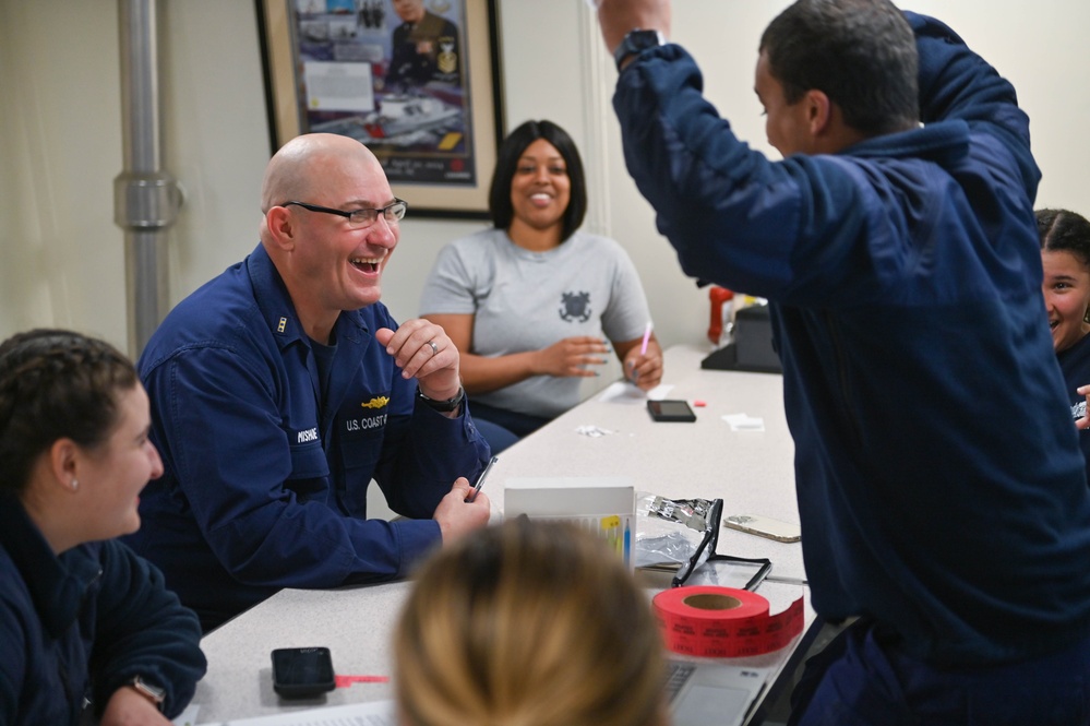 USCGC Calhoun crew members celebrate during trivia night