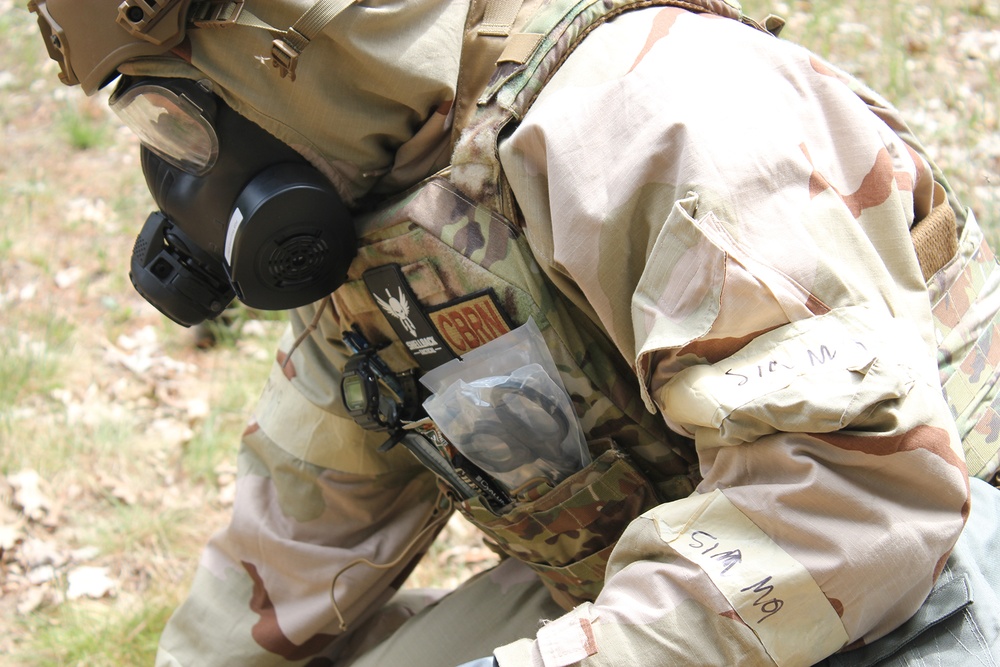 Emergency Management Airman monitors for hazards