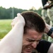 Participants of the 11th Annual Best Combat Camera Competition prepare to compete in an event.