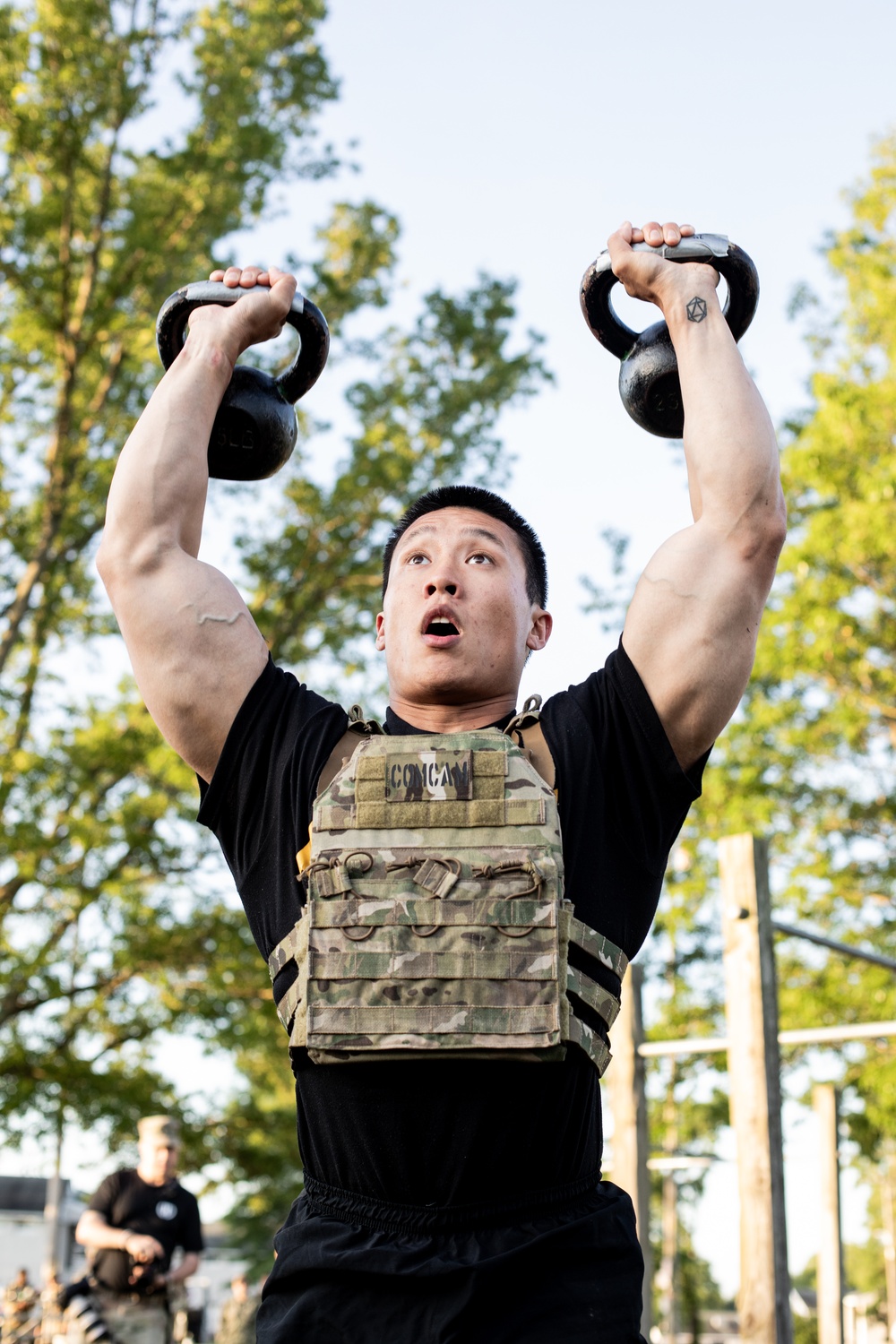 Participants of the 11th Annual Best Combat Camera Competition prepare to compete in an event.