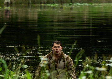 Participants of the 11th Annual Best Combat Camera Competition prepare to compete in an event.
