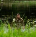 Participants of the 11th Annual Best Combat Camera Competition prepare to compete in an event.