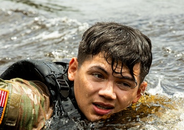 Participants of the 11th Annual Best Combat Camera Competition prepare to compete in an event.