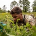 Participants of the 11th Annual Best Combat Camera Competition prepare to compete in an event.