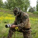 Participants of the 11th Annual Best Combat Camera Competition prepare to compete in an event.