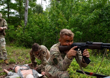 Participants of the 11th Annual Best Combat Camera Competition prepare to compete in an event.