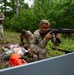 Participants of the 11th Annual Best Combat Camera Competition prepare to compete in an event.