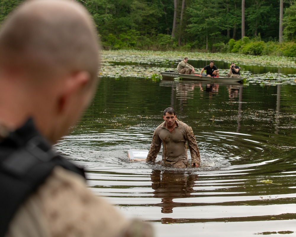 Participants of the 11th Annual Best Combat Camera Competition prepare to compete in an event.