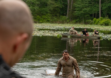 Participants of the 11th Annual Best Combat Camera Competition prepare to compete in an event.