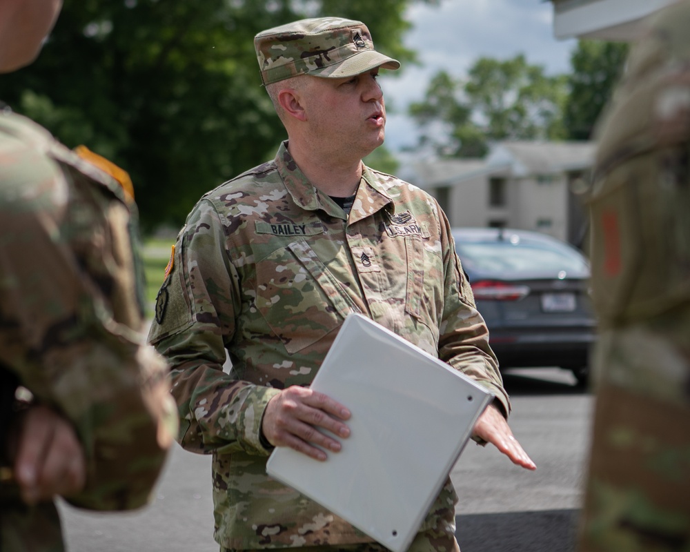 Participants of the 11th Annual Best Combat Camera Competition prepare to compete in an event.