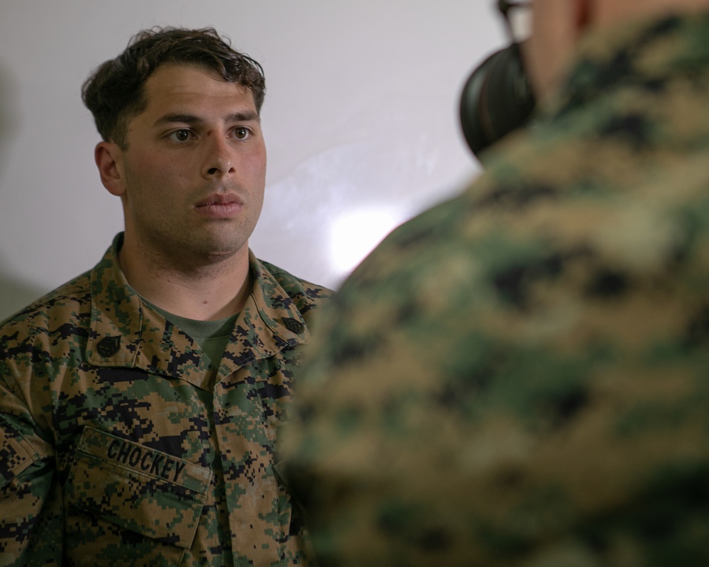 Participants of the 11th Annual Best Combat Camera Competition prepare to compete in an event.