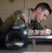 Participants of the 11th Annual Best Combat Camera Competition prepare to compete in an event.