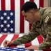 AFMAO prepares U.S. Flags
