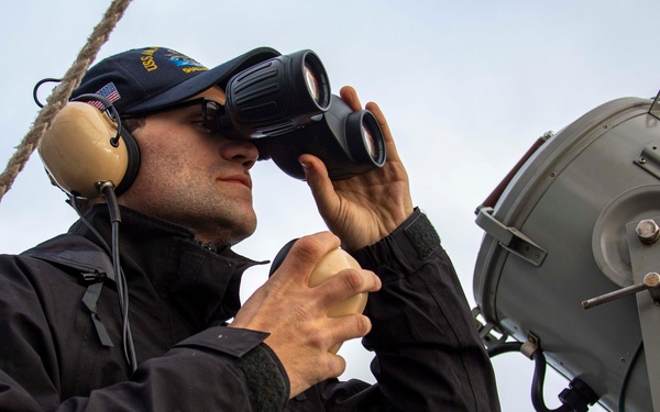 Sailors stand watch during flight operations