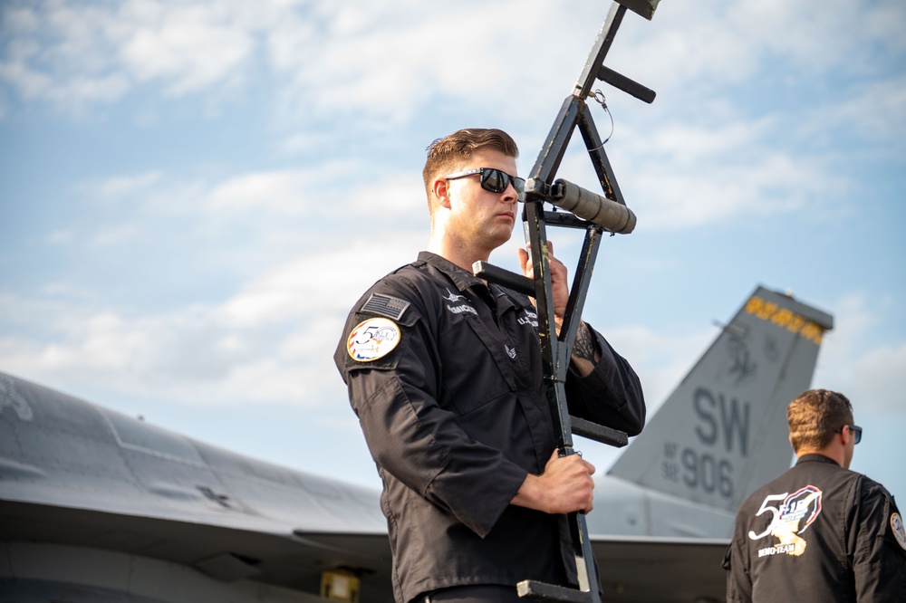 The F-16 Viper Demonstration Team perform at the Red, White and Blue Air Show