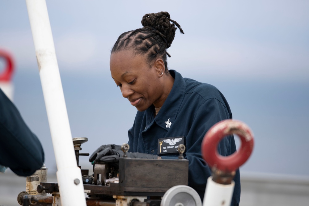 USS Tripoli Conducts Maintenance on Flight Deck Equipment