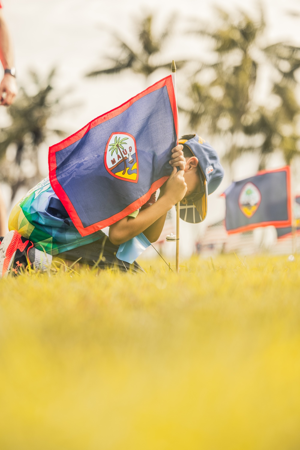 Community and Military Unite at Asan Beach Park for Memorial Day Flag Tribute