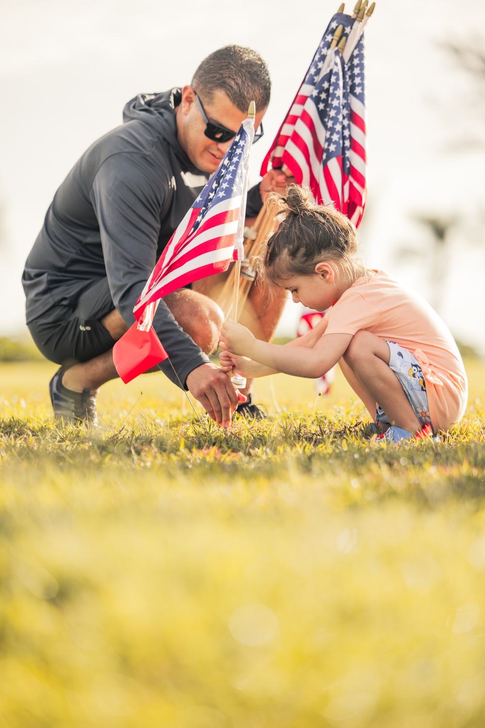 Community and Military Unite at Asan Beach Park for Memorial Day Flag Tribute