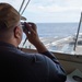 USS Ronald Reagan (CVN 76) Sailors stand watch in the pilot house