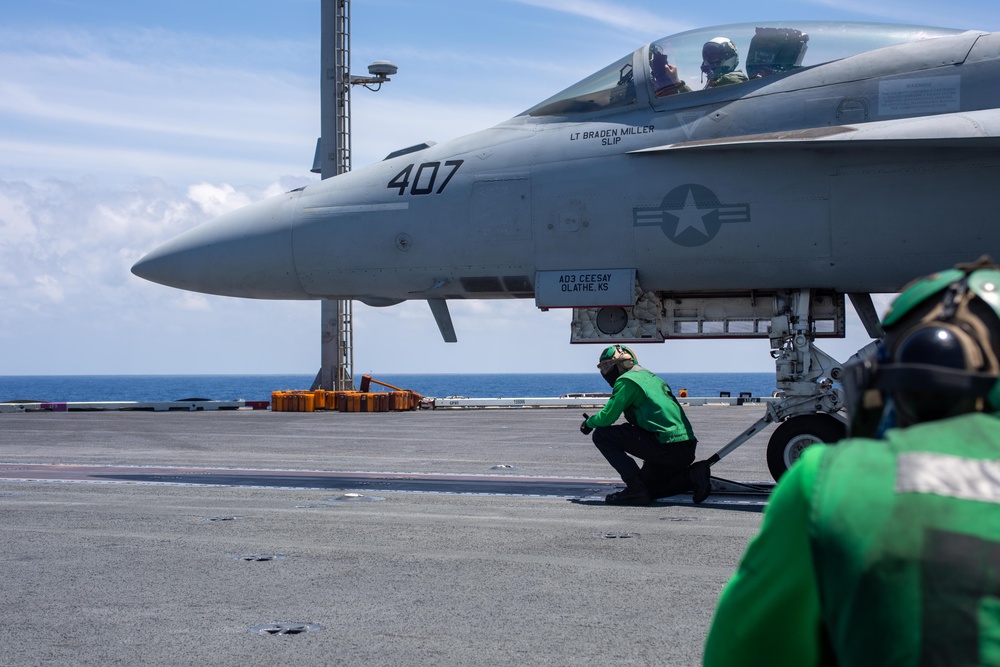 USS Ronald Reagan (CVN76) Sailors conduct flight deck operations