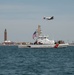 Warbird flies over USCGC Beluga during 2024 Bethpage Airhsow