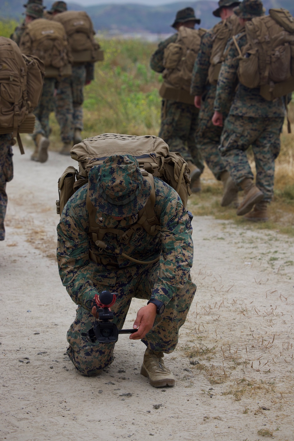 HQ Bn. Marines hike it out