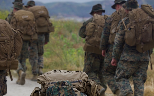 HQ Bn. Marines hike it out