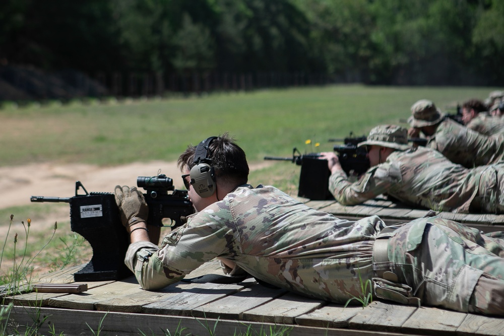 Participants of the 11th Annual Best Combat Camera Competition prepare to compete in an event.