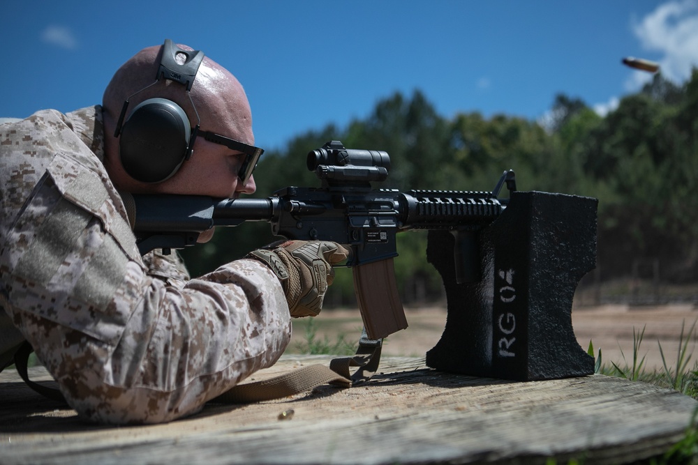 Participants of the 11th Annual Best Combat Camera Competition prepare to compete in an event.