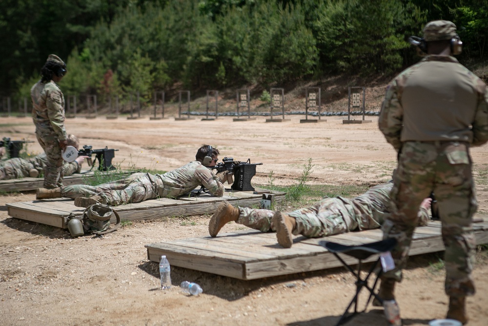 Participants of the 11th Annual Best Combat Camera Competition prepare to compete in an event.