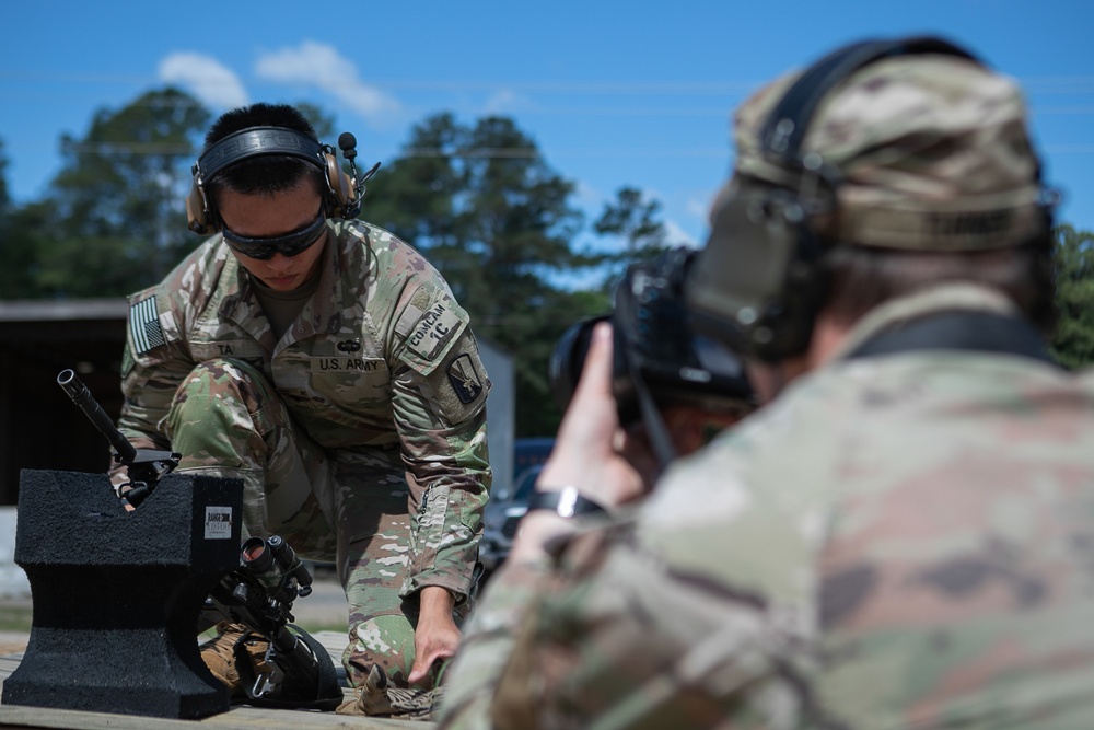 Participants of the 11th Annual Best Combat Camera Competition prepare to compete in an event.