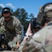 Participants of the 11th Annual Best Combat Camera Competition prepare to compete in an event.