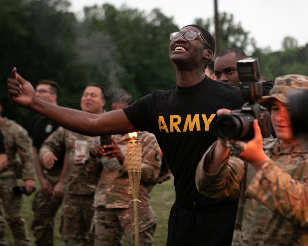 Participants of the 11th Annual Best Combat Camera Competition prepare to compete in an event.