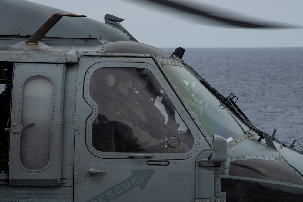 Capt. Pete Riebe participates in helicopter operations aboard Abraham Lincoln