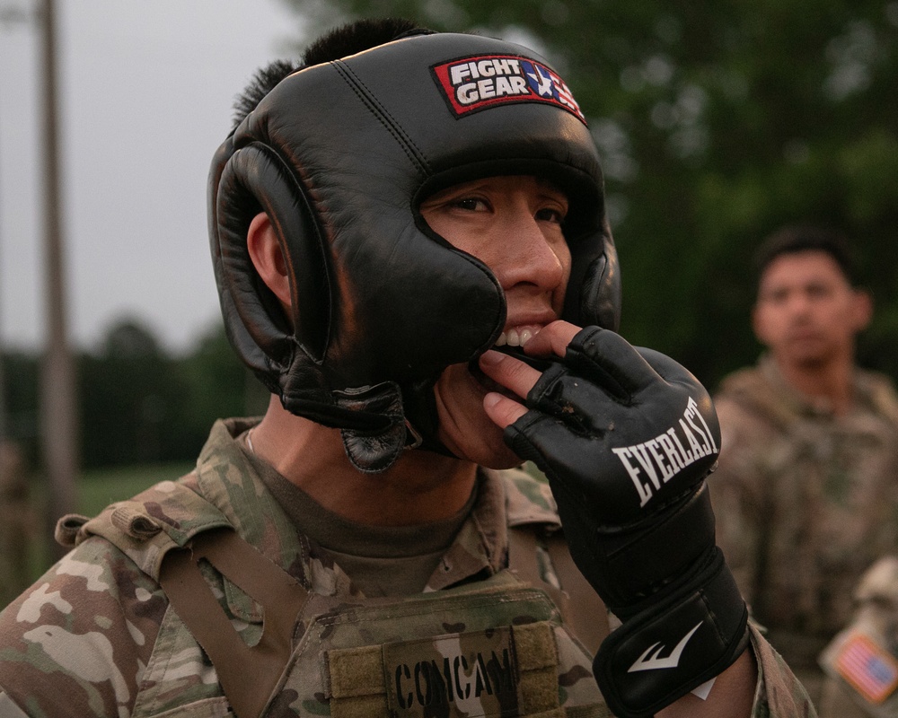 Participants of the 11th Annual Best Combat Camera Competition prepare to compete in an event.