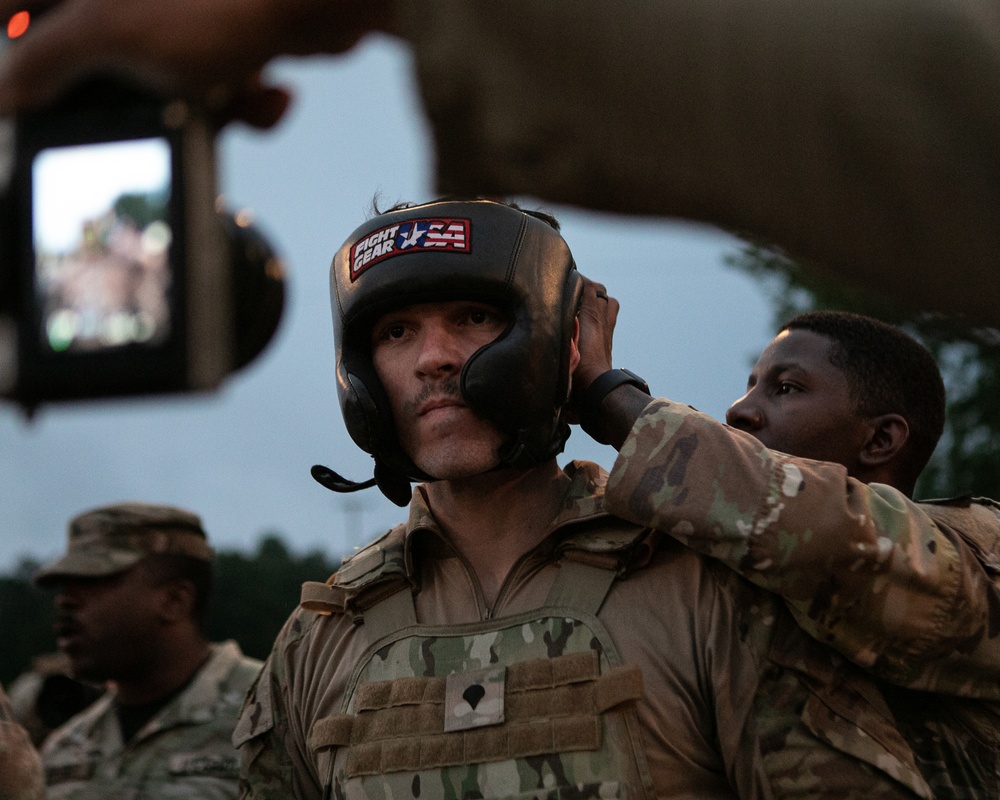 Participants of the 11th Annual Best Combat Camera Competition prepare to compete in an event.