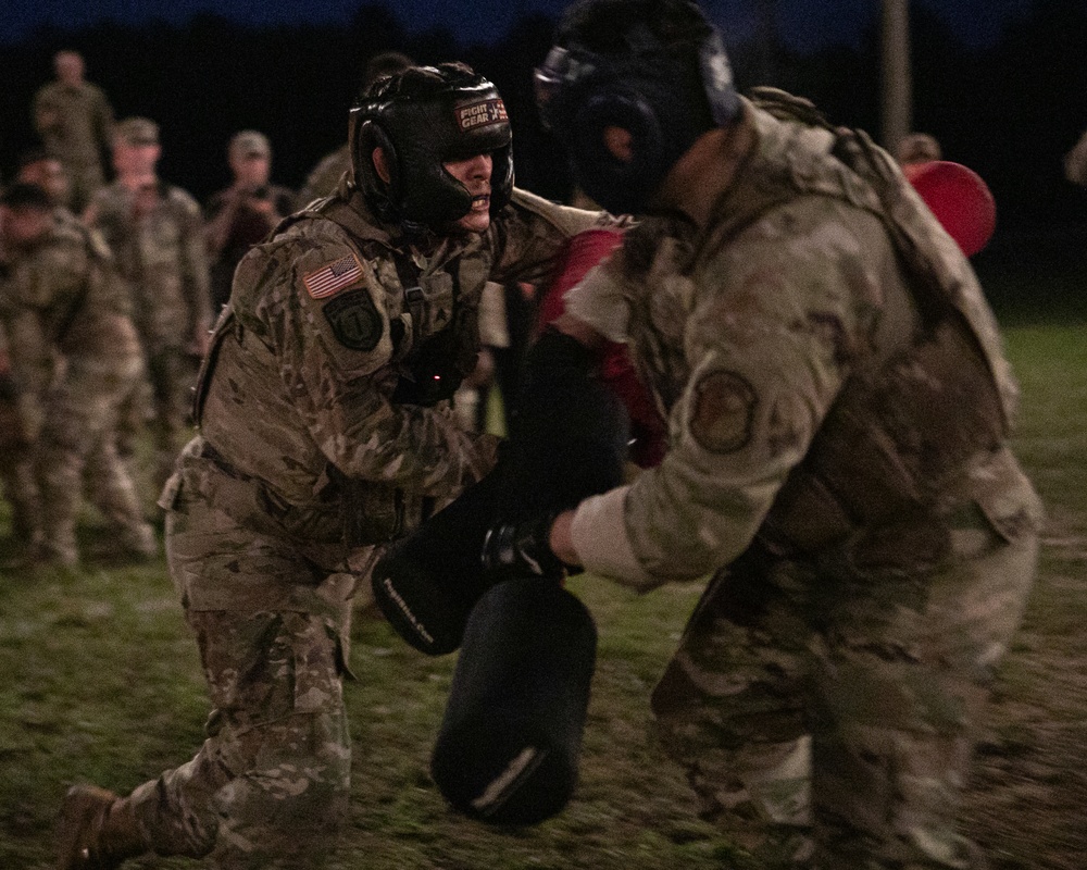 Participants of the 11th Annual Best Combat Camera Competition prepare to compete in an event.