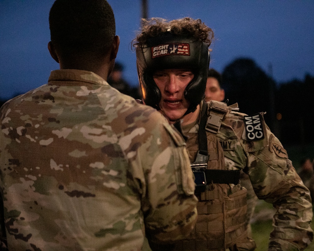 Participants of the 11th Annual Best Combat Camera Competition prepare to compete in an event.