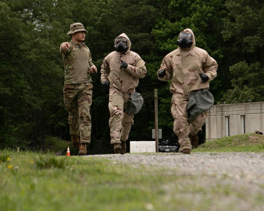 Participants of the 11th Annual Best Combat Camera Competition prepare to compete in an event.