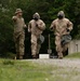 Participants of the 11th Annual Best Combat Camera Competition prepare to compete in an event.